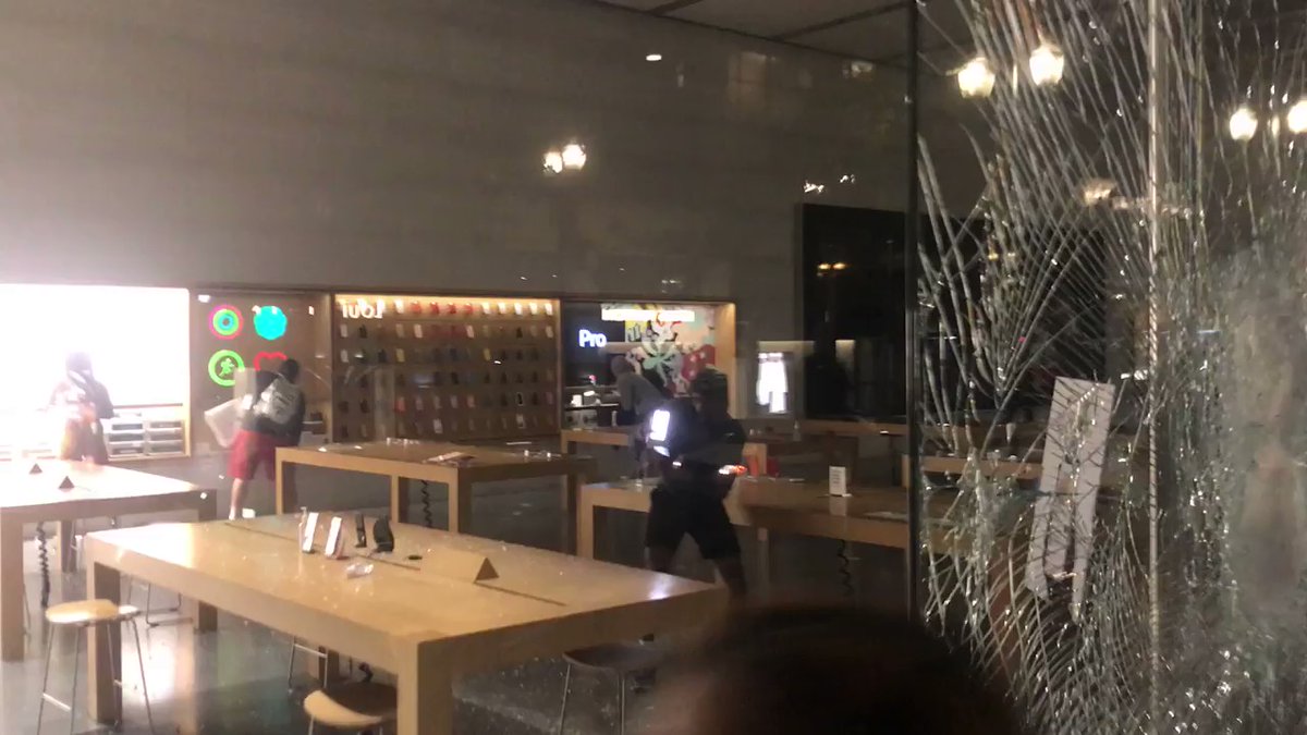 Looting broke out at the downtown Apple store during a riot in Portland. 