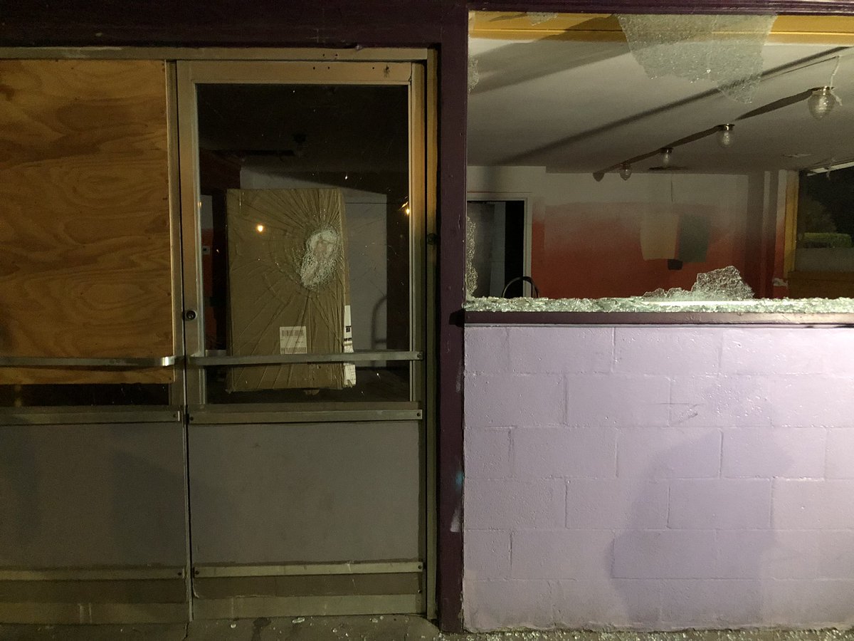 Marchers smashed out the windows of a vacant building on the corner of Albina and Rosa Parks Way as they started marching from Peninsula Park. That appears to be the only vandalism we can see from this brief demonstration