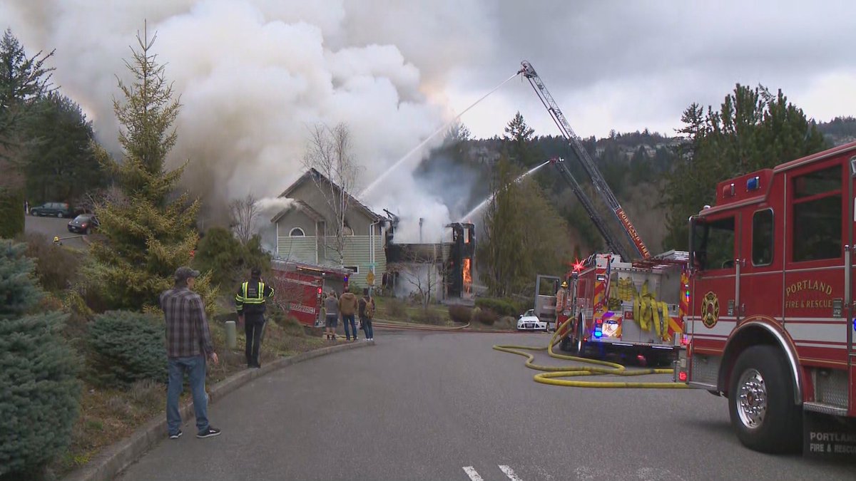 Portland Fire & Rescue is responding to two houses on fire near NW Burkhardt Ct. and Mill Pond Rd. in the Northwest Heights neighborhood close to the Beaverton/Portland boundary. KGW has a crew at the scene where flames and plumes of smoke are coming from one of the homes