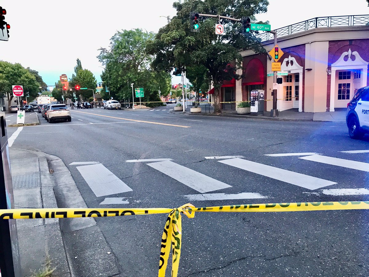 PortlandPolice investigating a homicide at NE Sandy and  Broadway where they found a car crashed into a pole with two shooting victims.  One dead, one with life threatening injuries.  Sandy Blvd CLOSED between NE 40th and  38