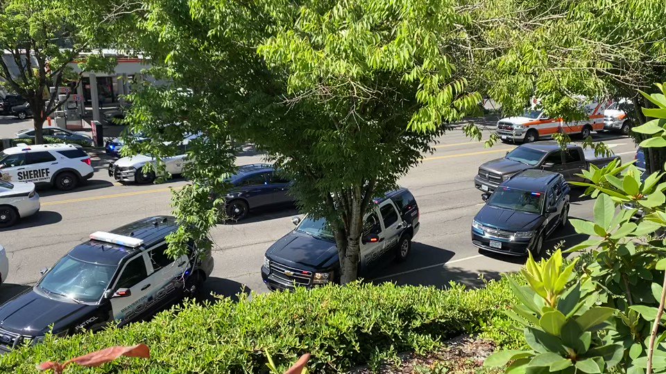 Large police presence on SW Nyberg St in Tualatin after reported office involved shooting. A witness tells she heard a bunch of gunfire and then was evacuated from the apartment buildings